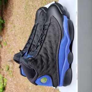 Used men size 10.5- Jordan retro 13 black hyper royal.